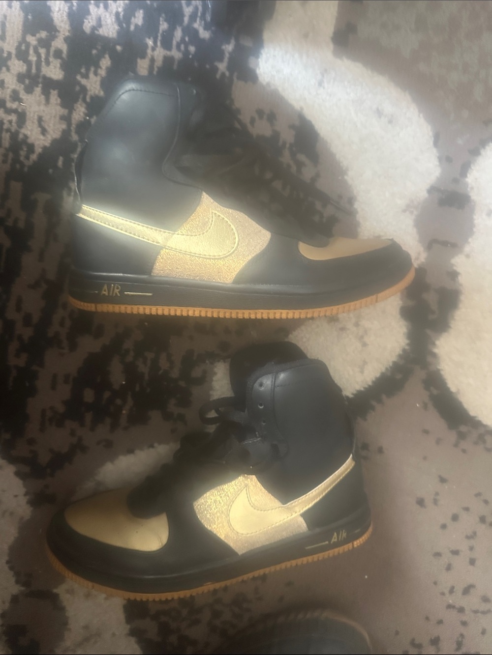 Nike Black and Gold High-Top